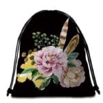 Serviette de plage ronde fleurs et plumes sac