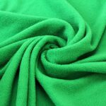 Serviette de plage en fibres absorbantes vert detail