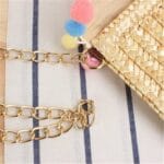 la chaines du sac bandouliere à chaines et pompons