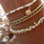 chaines de chevilles dorées à perles blanches