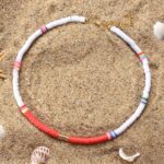Collier Surfeur Bicolore orange blanc