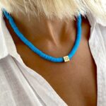 Collier Surfeur Disques Colorés Pendentif Œil bleu