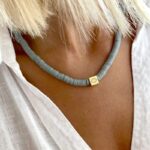 Collier Surfeur Disques Colorés Pendentif Œil gris