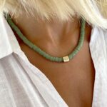 Collier Surfeur Disques Colorés Pendentif Œil vert