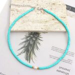 Collier surfeur couleur unie pendentif perle bleu